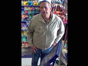 A man wanted by the Kingston Police in connection to a theft of a purse from a convenience store on March 5, 2023. (Supplied by the Kingston Police)