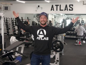 Chris Mccaffrey was all smiles inside of his new gym, Atlas Strength & Fitness, during its grand opening last weekend.