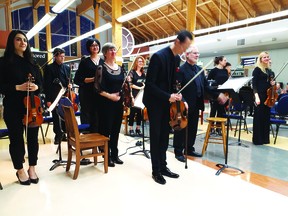 The Alberta Baroque Ensemble taking a bow at the conclusion of their concert in Beaumont in 2018. (Diane Tolley)