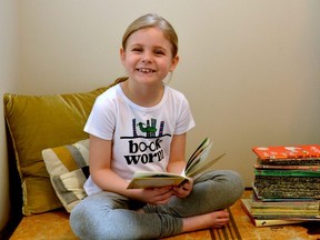 In her third year participating in the MS Read-a-Thon fundraiser, Stratford's Izzy Martchenko, 6, is working towards reading a total of 500 books before the fundraiser ends at the end of April, all in the name of raising money for the Multiple Sclerosis Society of Canada. (Galen Simmons/The Beacon Herald)