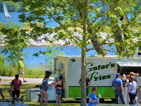 Visitors lining up at Gator’s Fries food truck near the waterfront during Pop-Ups on the Bay in Belleville, Ontario.