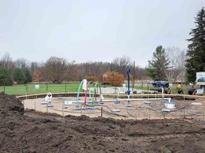 The splash pad being installed in Paisley last fall (Paisley Splash Pad Committee Facebook page)