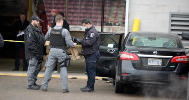 Police investigate an incident at GFL Memorial Gardens, near Bay Street, on Friday, March 17, 2023 in Sault Ste. Marie,. Ont. (BRIAN KELLY/THE SAULT STAR/POSTMEDIA NETWORK)