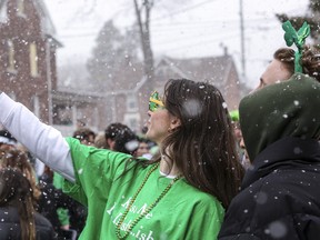 Thousands of students party on Aberdeen Street in Kingston’s University District to mark St. Patrick’s Day on Saturday.
