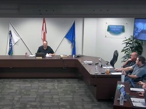 At Woodlands council, (l-r) Infrastructure Director Andre Bachand and councillors Alan Deane, Jeremy Wilhelm, Peter Kuelken, Reeve John Burrows, Bruce Prestidge and Devin Williams discussed issues including a new plow truck.