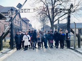 A group of 24 educators from across Ontario including Avon Maitland District School Board human rights and equity lead administrator Jason Burt and human rights and equity coach Paul Finkelstein recently participated in a week-long Holocaust education tour in Poland as part of the Friends of Simon Wiesenthal Center for Holocaust Studies' Compassion to Action program.  Pictured, the group of educators pose for a photo at the site of the former Auschwitz-Birkenau concentration camp.  Submitted photo