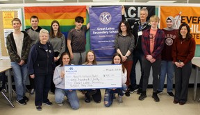 Great Lakes secondary school’s Key Club presented a $150 cheque to the Bluewater Health Foundation Wednesday for the Youth Wellness Hubs Ontario centre in Sarnia. Back row from left are club members Jonas Johansen, Owen Roberts, Kiwanis club co-ordinator Sheila Donald, Ivy Schleihauf, Ethan Purdon, Kendra King, Kiwanis club co-ordinator Dennis Louks, Gaig Smale, Jode Nour, and Kathy Alexander, executive director of the Bluewater Health Foundation. In front from left are club vice-president Kyleigh Noels, president Abby Wright, and vice-president Valerie De Rechter. Terry Bridge/Sarnia Observer/Postmedia Network