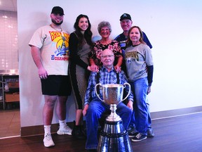 Justin Lawrence, 2022 Grey Cup Champion with the Toronto Argonauts, brought the famous trophy to Telford Mews in Leduc, March 18, where his grandparents Lorne and Sharon Lawrence are living. Residents of the facility got to take their picture with the Cup and meet Lawrence. (Dillon Giancola)