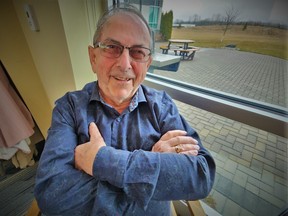 Garnet Thompson, 75, filed his last day March 18 at Lafferty’s Crossings where he worked at the menswear shop for the last 10 years of his 55-year career. DEREK BALDWIN