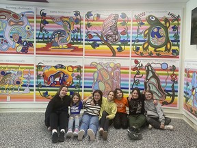The foyer at AB Ellis Public School is now home to a striking 40-foot-long, 10-panel Indigenous mural. Forty-seven students from Grades 4 to 8 helped paint the mural under the direction of local Indigenous artist Michael (Cy) Cywink and his apprentice, Gerry Ranger. Student artists included, from left, Riley Main, Fayth Trottier, Ashley Cacal, Alyssa Lamothe, Eden Lester, Keely Quinn and Mckayla Myllynen.