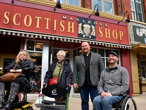 MacLeods Scottish Shop was presented with Stratford's 2022 accessibility award at Monday's council meeting.  Pictured from left are Stratford accessibility advisory committee vice chair Diane Sims, Scottish shop customer and the person who nominated the store for the award, Bettie Mollins, store owner Rob Russell, and advisory committee chair Roger Koert.  Galen Simmons/The Beacon Herald/Postmedia Network