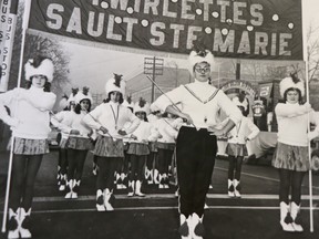 Patti Gardi leads Sault Ste. Marie Twirlettes at a Grey Cup parade in Toronto in 1962.