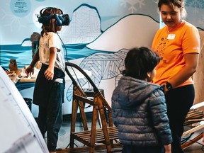A virtual reality dogsled experience is among the attractions at a travelling exhibit celebrating Indigenous customs and innovations.
