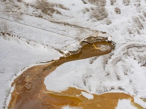 A tailings pond at Imperial Oil's Kearl Lake oilsands operation north of Fort McMurray on February 25, 2023. Image by Nicholas Vardy for Athabasca Chipewyan First Nation