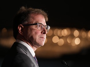 B.C. Health Minister Adrian Dix pauses while responding to questions during a news conference in Vancouver on Monday, November 7, 2022. Dix&ampnbsp;plans to announce actions on how the government will ensure patients in the province will have secure access to the diabetes and weight loss drug Ozempic.