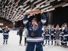 Fort McMurray-raised athlete Lyndsey Janes celebrates after the Mount Royal Cougars are named the U Sports National Champions in Montreal on Sunday, March 19, 2023. Image supplied by the University of Montreal