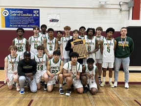 The Holy Trinity Knights basketball team pose with their silver medals won at 3A Basketball Provincial Championships  in Wetaskiwin. Supplied Image/Holy Trinity Catholic High School