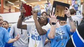 Keyano’s men’s and women’s futsal teams celebrate after winning gold at ACAC Championships at the Syncrude Sport and Wellness Centre on March 12, 2023. Photo by Robert Murray for Keyano College