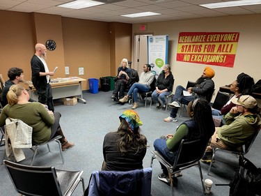 Scott Florence, executive director for the Sudbury Workers Education and Advocacy Centre, leads a discussion to mark the International Day for the Elimination of Racial Discrimination at the Greater Sudbury Public Library's MacKenzie Street branch in Sudbury, Ontario on Saturday, March 18, 2023. Migrants and supporters held rallies and other events in Sudbury, Edmonton, Montreal, Toronto, Vancouver and Niagara Falls on Saturday and Sunday to call on Prime Minister Justin Trudeau to ensure permanent resident status for all migrants and refugees, including undocumented people, as he promised in December 2021. According to the Migrant Rights Network, more than 1.7 million migrants grow food, take care of children, the sick and the elderly, and are essential to Canadian communities, but are denied rights available to everyone else because they don’t have permanent resident status. For more information, visit www.migrantrights.ca. Ben Leeson/The Sudbury Star/Postmedia Network