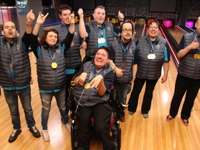 Members of Special Olympics Wood Buffalo pose with their medals after a bowling practice at The Alley on Wednesday, March 1, 2023. The medals were won at the Special Olympics Arctic Winter Games in Strathcona County, Alta. between Feb. 24 and 26. Vincent McDermott/Fort McMurray Today/Postmedia Network
