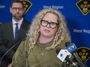 Karen Pyatt-Westbrook of the Older Adults Centres' Association of Ontario speaks about the growing number of grandparent scams in the province at a news conference at OPP West Region headquarters in London on Wednesday, March 22, 2023. (Derek Ruttan/The London Free Press)