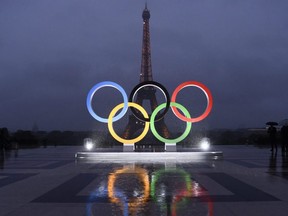 The Olympic Rings is seen on the Trocadero Esplanade near the Eiffel Tower in Paris, Sept. 13, 2017.
