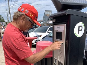 Dennis Klem tried a pay station in July 2022 as a new paid parking system was tested in Port Dover.