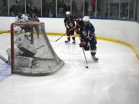 Tanner Chapman take the puck behind the net of the Sylvan Lake Wranglers during the HJHL North Division Finals in a home game on March 10. It was a back-and-forth series at the start, but the Thunder were ultimately knocked out of playoffs after losing 4 - 2.