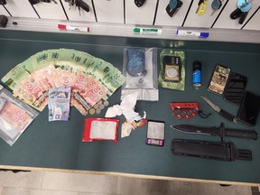 Central Hastings OPP, while performing a wellness check on occupants of a running vehicle on Saturday in Stirling-Rawdon wound up confiscating cocaine and Fentanyl, scales, prohibited weapons, multiple cell phones and a large amount of cash. OPP PHOTO