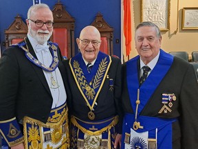 One of Belleville's prominent citizens and former long-time manager of the Belleville Utilities, Neil Britton, was honoured by the Shrine Club recently with the presentation of his 70-year membership pin. Left to right at the presentation are Grand Master Thomas Hogeboom,  Neil Britton and Immediate past Grand Chapter secretary Terrance Shannon. SUBMITTED PHOTO