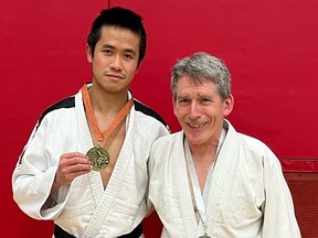 Quinte Judo Club Sensei Gilbert Mooney, right, competed against an opponent half his age and in a higher weight class, and came away with a silver medal as well as valuable points toward his 4th Degree Black Belt. SUBMITTED PHOTO