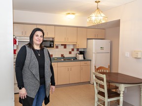Anne Ruddell, community development manager at Nova Vita in Brantford, stands inside one of the transitional housing units that is in need of updating. Brian Thompson