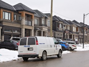 A Brantford Police forensic identification truck sits in front of homes on Macklin Street in Brantford on Monday March 13, 2023. Vehicles and houses in the neighbourhood were hit by bullets following a shooting Thursday afternoon on nearby Bowery Road that sent a 29-year-old victim to hospital.