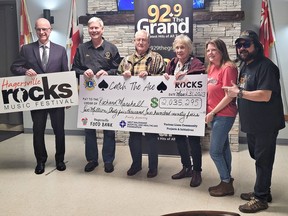 Richard and Lorna Marshall (center) were presented a check for just over $2 million on Friday March 31, 2023 by Rob Phillips (left), president of the Hagersville Chamber of Commerce, Hagersville Lions Club event chair Dan Matten, Hagersville Rocks committee member Tanya Ribbink, and Ray Michaels of 92.9 The Grand.  Marshall won the Catch the Ace Draw, in its 45th week.  in Hagersville, Ontario.  SUBMITTED PHOTO