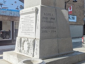 Memorial Restorations of Sarnia worked several hours Wednesday on trying to remove the damaged caused when swastikas were spray-painted on the cenotaph in downtown Chatham.  (Handout)