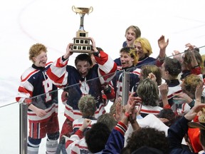 St. Joseph's Panthers players celebrate with the Bishop Cup. Photo on Wednesday, March 8, 2023, in Cornwall, Ont. Todd Hambleton/Cornwall Standard-Freeholder/Postmedia Network