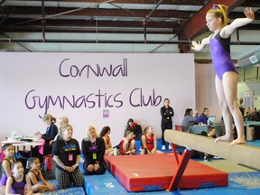 Cornwall Gymnastics Club member Victoria Lefave performs on the balance beam in front of teammates and coaches during the club's Cotton Candy Classic invitational meet held on Saturday March 18, 2023 in Cornwall, Ont. Greg Peerenboom/Special to the Cornwall Standard-Freeholder/Postmedia Network
