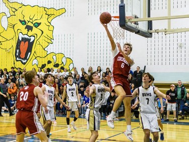 Cobras Simon Baker tosses a layup against Bobcats at Bow Valley High School in Cochrane on Thursday, March 2, 2023. The Bobcats beat the Cobras 76-69 in the RVSA play-off semifinal.