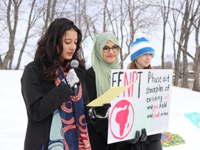 Sophia Mathur, left, speaks out about climate concerns at day of action at Tom Davies Square in March, with support from fellow youth activists Salma Mohamed and Jane Walker.