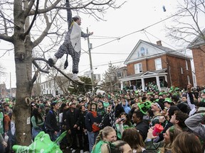 Thousands of students party on Aberdeen Street in Kingston's University District to mark St. Patrick's Day on Saturday, March 18, 2023.