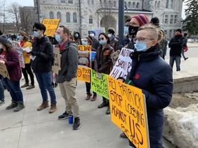 Queen's University graduate students rally for more funding and better pay at the university in Kingston, Ont., on Wednesday, March 22, 2023.