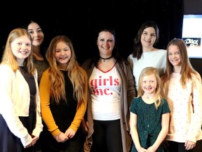 Attending the International Women's Day celebrations held at the Firehall Theatre in Gananoque on March 8 were members of Girls Inc., a program promoting STEM and bright futures for all young women. L-r, Rylynn Pugh, Mandi Slate, Ava Slate, Candice Serson, Lissa Burgess (at back), Sierra Pugh, and Ella Higgs.  Lorraine Payette/for Postmedia Network