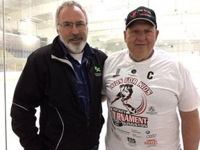 Tony Gargaro, left, director of operations with BGC South East, and Garry McColman, chairman of the Kids for Kids Hockey Tournament, at the Invista Centre on March 30, 2017.