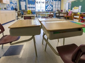 An empty classroom in London.