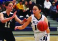 The Chinook Basketball League held its all-star game Wednesday at F.P. Walshe school in Fort Macleod, with the white team pulling out a 77-53 win over the dark team. Here, Melia Leishman of the Matthew Halton Hawks (11) defends against Sloane Girer of the F.P. Walshe Flyers..