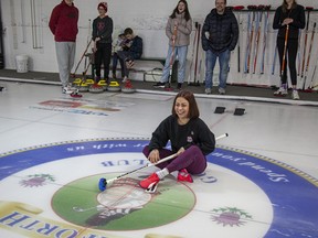 Ukrainian newcomers enjoying their new home and learning how to curl. Submitted
