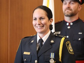 Sarnia Deputy Chief Julie Craddock smiles after her wearing-in ceremony in council chambers at Sarnia city hall Monday.