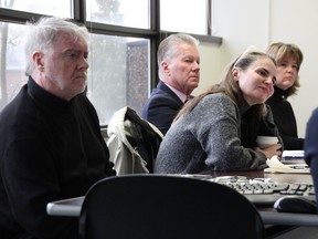 Sarnia police board members Mike Bradley, left, George Vandenberg, Charlene Sebastian, and vice chair Kelly Ash look on during a meeting March 23, 2023. (Tyler Kula/ The Observer)