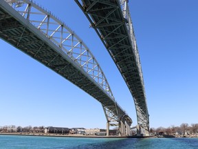 Blue Water Bridge's twin spans link Sarnia's neighbour, Point Edward, with Port Huron, Mich., over the St. Clair River.  The original 1938 span, right, is to close for about 100 days this summer for maintenance.  (Paul Morden/The Observer)