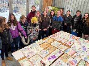 Students from Valley Heights Secondary School with the art work they created at a Moccasin Identifier Project workshop held earlier this month.  Their art work and that of students from other local high schools will be used to create a mural on the east wall of Long Point Eco Adventures observatory building in the fall.  Organized by the Long Point Biosphere Region, the workshop focused on treaty rights, truth and reconciliation and art.  CONTRIBUTED